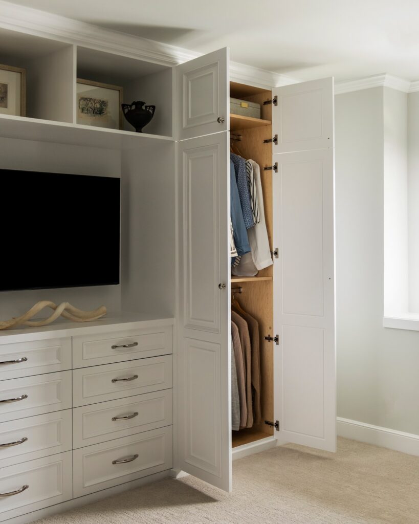 Built in custom wardrobe in primary suite remodel