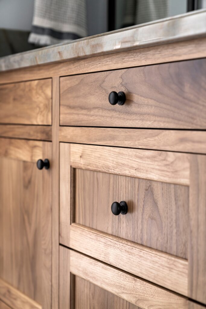 Renovated bathroom vanity drawers in remodel by Melinda Mandell