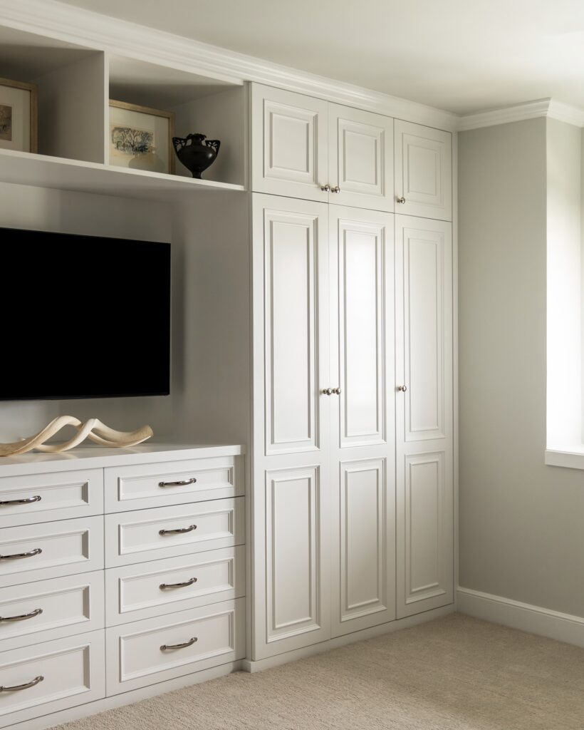 Primary suite cabinets in renovated bedroom by Melinda Mandell
