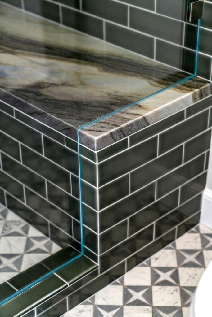 Close up of shower tile and glass remodel in California home